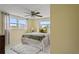 Inviting bedroom with plush bedding, natural light, and comfortable decor at 7401 Islander Ln, Hudson, FL 34667