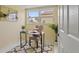 Cozy office area with a desk, chair, and bright window at 7401 Islander Ln, Hudson, FL 34667