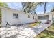 Backyard patio featuring space for entertaining and activities at 7441 Cypress Dr, New Port Richey, FL 34653