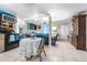 Spacious open-concept living room and eat-in kitchen perfect for entertaining at 7441 Cypress Dr, New Port Richey, FL 34653