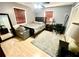 Nicely decorated bedroom with desk area, area rug and modern decor at 8834 Whispering Oaks Trl, New Port Richey, FL 34654
