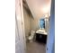Contemporary half bathroom with a vessel sink and sleek fixtures at 9005 W Flora St, Tampa, FL 33615