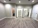 Spacious flex room with adjacent closets and doors at 9005 W Flora St, Tampa, FL 33615