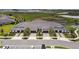 Elevated aerial shot displaying modern residential construction with lush landscaping at 10282 Echo Dock Loop, San Antonio, FL 33576