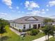 Overhead angle showcasing the home's appealing exterior, tidy landscaping, and charming neighborhood at 10282 Echo Dock Loop, San Antonio, FL 33576