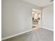 This bedroom view shows an entrance leading into the kitchen at 10282 Echo Dock Loop, San Antonio, FL 33576
