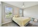 Bedroom with natural light, neutral walls, and stylish furnishings at 10282 Echo Dock Loop, San Antonio, FL 33576