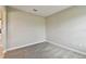 This bedroom features neutral walls and plush carpet at 10282 Echo Dock Loop, San Antonio, FL 33576