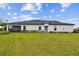Well-maintained lawn and attractive landscaping complement the home's exterior at 10282 Echo Dock Loop, San Antonio, FL 33576