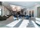 Bright lounge featuring wood floors, comfortable seating, and stylish decor at 10282 Echo Dock Loop, San Antonio, FL 33576