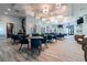 Comfortable resident lounge offering many tables and chairs, plus lots of natural light at 10282 Echo Dock Loop, San Antonio, FL 33576