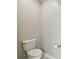 Classic powder room featuring a white toilet, neutral walls, and a convenient toilet paper holder at 10282 Echo Dock Loop, San Antonio, FL 33576