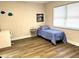 Bright bedroom with luxury vinyl flooring, closet and lots of natural light at 10287 Fordham St, Spring Hill, FL 34608
