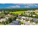 Aerial view of the property and its surrounding neighborhood, conveniently located near a sports field at 10399 Boyette Brook St, Riverview, FL 33569