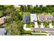 Aerial view of the property with great curb appeal and a well-maintained yard in a residential neighborhood at 10399 Boyette Brook St, Riverview, FL 33569