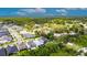 An aerial view showing the location of the property in a lush neighborhood with tree-lined streets at 10399 Boyette Brook St, Riverview, FL 33569