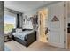 Comfortable bedroom featuring a modern daybed and a wall decorated with sports memorabilia at 10399 Boyette Brook St, Riverview, FL 33569