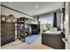 Nicely decorated bedroom with a bunkbed that has a desk area and a single bed at 10399 Boyette Brook St, Riverview, FL 33569
