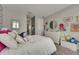 Light-filled bedroom with stylish decor, offering a cozy and inviting atmosphere at 10399 Boyette Brook St, Riverview, FL 33569