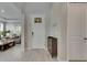 Charming foyer and living room with tile flooring, neutral paint, and large windows at 10399 Boyette Brook St, Riverview, FL 33569