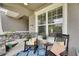 Charming front porch with rocking chairs, decorative pillows, and cozy decor at 10399 Boyette Brook St, Riverview, FL 33569