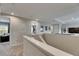Upstairs hallway with an open floor plan and views into the bedrooms and living room at 10399 Boyette Brook St, Riverview, FL 33569