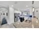 Bright kitchen features stainless steel appliances, white cabinets, and granite countertops at 10450 Highland Park Pl, Palmetto, FL 34221