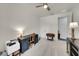 Office with neutral carpet, desk and a ceiling fan at 10450 Highland Park Pl, Palmetto, FL 34221