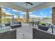 Outdoor patio area with comfortable seating and a beautiful view of the community at 10450 Highland Park Pl, Palmetto, FL 34221