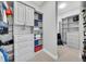 Beautiful closet featuring custom organizers and shelves for maximum storage and organization at 10450 Highland Park Pl, Palmetto, FL 34221