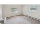 Neutral bedroom with carpet and window for a minimalist and comfortable space at 111 E Early St, Brooksville, FL 34601