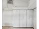 Large storage room featuring white storage cabinets in a well-lit space at 111 E Early St, Brooksville, FL 34601