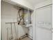 This utility room features a water heater and a door to the backyard at 111 E Early St, Brooksville, FL 34601