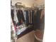 Spacious walk-in closet with shelving, hanging rods, and plenty of room for storage and organization at 12133 Spartan Way # 203, Hudson, FL 34667