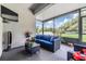 Screened in lanai with outdoor furniture, a ceiling fan, and views of the fenced backyard at 12251 Duckett Ct, Spring Hill, FL 34610