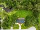 Expansive lot with mature trees, private pond, and ample green space at 12603 Corral Rd, Tampa, FL 33626