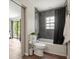 Full bathroom with tub, shower, and access to a balcony at 12603 Corral Rd, Tampa, FL 33626