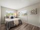 Cozy bedroom with plush bedding, gray accents, and wood-look flooring at 12603 Corral Rd, Tampa, FL 33626