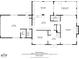 Main level floor plan featuring kitchen, dining area, living room, foyer, garage, and screened porch at 12603 Corral Rd, Tampa, FL 33626