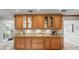 Custom kitchen cabinetry with granite countertops, offering ample storage and prep space at 12603 Corral Rd, Tampa, FL 33626