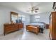 Relaxing bedroom with tile floors and ample storage, offering a serene retreat at 12877 Palm Dr, Largo, FL 33774