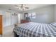 View of the bedroom with neutral tones, natural light, and closet for storage at 12877 Palm Dr, Largo, FL 33774