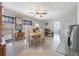 Bright and airy dining area with natural light, comfortable seating, and ample space at 12877 Palm Dr, Largo, FL 33774