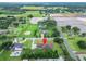 Lovely single-story home with a manicured lawn and convenient driveway in a quiet, countryside community at 13102 Done Groven Dr, Dover, FL 33527