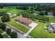 Beautiful single-story home with a neatly maintained lawn and long driveway in a peaceful, rural neighborhood at 13102 Done Groven Dr, Dover, FL 33527
