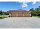 A house with a spacious three car garage at 13102 Done Groven Dr, Dover, FL 33527