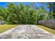 The backyard has a concrete block area at 16138 Manorwood Cir, Tampa, FL 33624