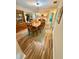 Spacious dining room featuring a large wooden table and ample seating at 1814 Driftwood S Cir, Oldsmar, FL 34677