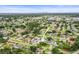 Aerial view of property in suburban neighborhood with pool at 1848 68Th N Ave, St Petersburg, FL 33702