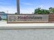 A stone sign marks the entrance to Meadowlawn in St. Petersburg, Florida at 1848 68Th N Ave, St Petersburg, FL 33702